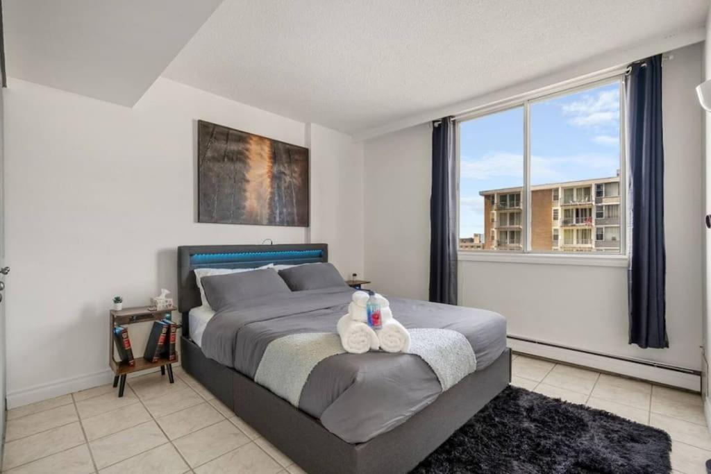 Downtown Near Rogers Place With Covered Parking, Sleeps 6, Pool Table, Sauna, Gym, Two Bedrooms &